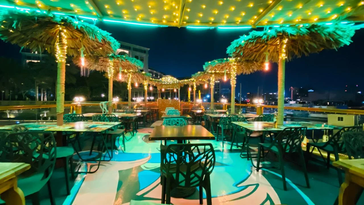 Dubai Water Canal dhow cruise with buffet dinner and illuminated landmarks