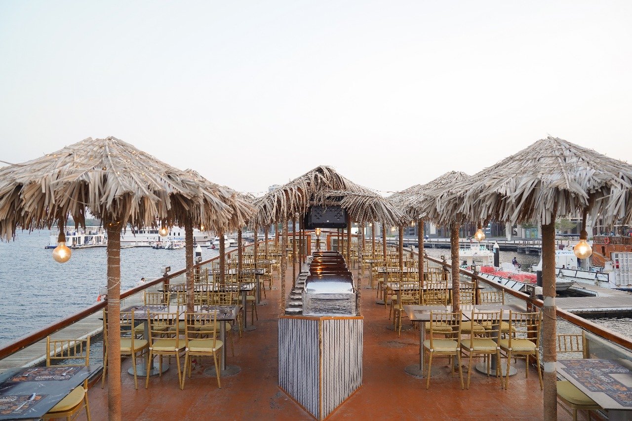 Wooden Al Seef dhow cruise Dubai with heritage waterfront views