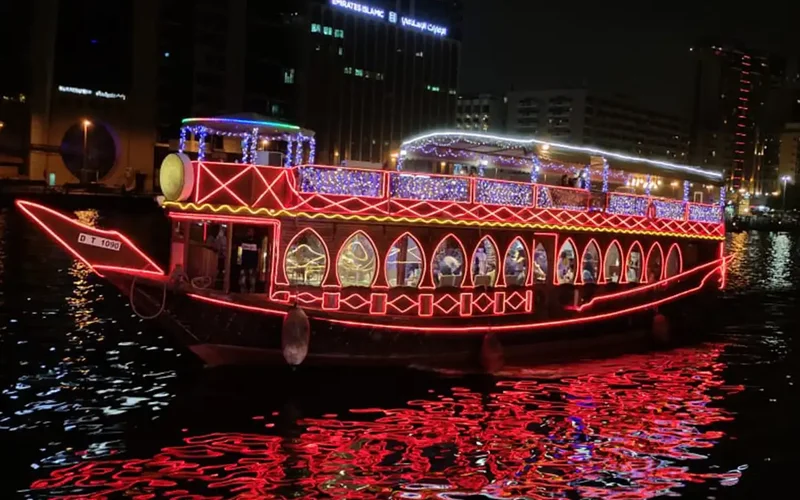 Wooden dhow cruise on Dubai Deira Creek with buffet dinner and heritage views